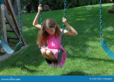 upskirt girl|Child In Pink Skirt Swings In Park During Stock Footage